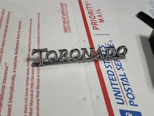 NOS 1967-1971, 1975 OLDSMOBILE TORONADO TRUNK EMBLEM-PART NO. 9864290 picture
