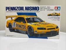 Tamiya - Pennzoil Nismo Nissan GT-R R34 1/24 Plastic Model Kit (24216) picture