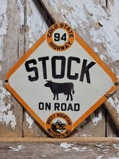 VINTAGE ROCKY MOUNTAIN MOTORISTS PORCELAIN SIGN OLD COLORADO HIGHWAY COW CATTLE picture