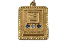 1/10 10K GOLD FILLED SAPPHIRES GENERAL MOTORS CHARM PENDANT picture
