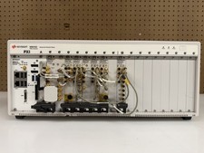 Keysight M9018A Pxie Chassis w/ M9037A, M9311A, M9310A, M9301A, M9214A, M9350A.. picture