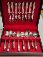 Holmes and Edward's 49 piece inlaid silver set in original case. vintage 1938 picture