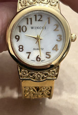 Wincci Ladies Elegant Metal Bangle Cuff Fashion Quartz Analog Watch Pearl Dial picture