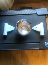 1972 Suzuki GT 380, GT 550, GT 750 headlamp assembly and ears picture