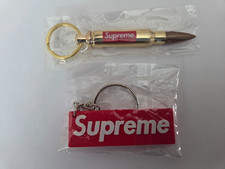 2pcs Supreme: 1 Keychain Bullet Bottle Opener and  1 3D Box Logo picture