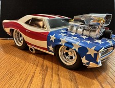 Muscle Machine Stars & Stripes 1966 Pontiac GTO 1/24 #71166 picture