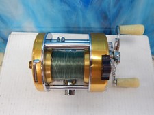 Penn Levelmatic 910 Vintage Baitcasting Reel, needs parts bearing cup, spring picture