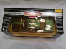 ERTL American Muscle 1969 Plymouth Road Runner  1/18  Jamaica Blue/Black Stripe picture