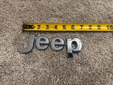 Jeep emblem letters badge symbol Patriot Wrangler OEM Factory Genuine Stock picture