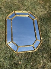 Vintage gold faux bamboo octagonal wall mirror with a double-frame design. picture