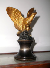 A RARE ANTIQUE METAL AMERICAN EAGLE FLAG POLE TOPPER ON CIRCULAR WOODEN BASE picture