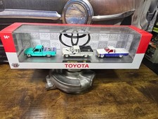 M2 Machines - Toyota Series  1985 TOYOTA TRUCKS  3-Pack  S46 picture