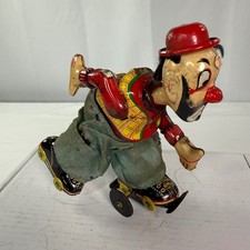 Vintage TPS Japan Wind Up Tin Litho Roller Skating Clown Toy Collectible picture