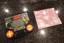 Vintage JUDGE DREDD with BOOKLET  by TIGER Handheld Electronic LCD Video game D7 picture