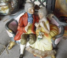 Vintage Bisque Royal Crown Cucci Victorian Man and Woman on Couch Figurine picture