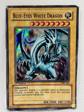 Yugioh | Blue-Eyes White Dragon SKE-001 1st Edition Super Rare 2004 TAPED DAMAGE picture