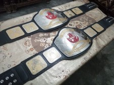 The 84 WWF OLD CLASSIC TAG-TEAM WRESTLING CHAMPIONSHIP BELT. (SAME TWO BELTS ) picture
