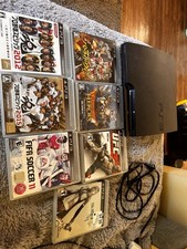 Sony PlayStation 3 + Games picture