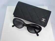 Chanel CH5515 54mm Oval Sunglasses in Black with Polarized Gray Lens picture