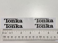 Tonka Logo Stickers 2 Inch Black Lettering Transparent 2.25 Inch Wide Background picture