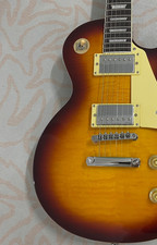 Best-selling brown electric guitar flam maple top HH pickups mahogany body US picture