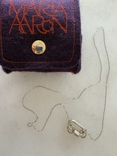 Marla Aaron 10ktWG & 18kYG 15 in necklace & SS Baby Lock set. Comes with pouch picture