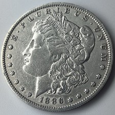 1886-O Morgan Silver Dollar Fine Condition 90% Silver picture