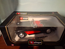 Bburago Gold 1957 Chevrolet Corvette 1:18 Diecast Car Black/Red w/ Case picture