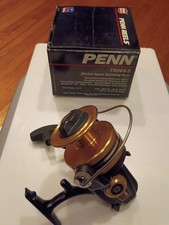 VINTAGE ( PENN ) 7500-SS Black & Gold SPINNING REEL/ SKIRTED SPOOL/ ORIGINAL BOX picture