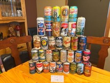 Really nice lot of Vintage ,and collectable cans (34)..pretty good display picture