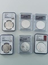 1885-O Morgan MS63, 1923 Peace MS64, 2014 +2026 ASE MS69, 2 Buffalo rounds 69+70 picture