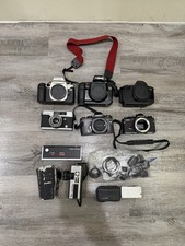 lot of vintage canon cameras and others for parts or repair  picture