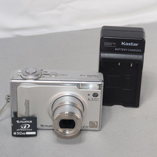 Fujifilm FinePix F10 6.3MP Digital Camera W 512mb XD *TESTED* W Charger picture