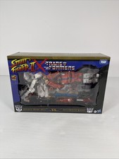 Transformers Street Fighter II x Optimus Prime Ryu vs Megatron M. Bison NEW picture