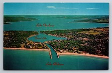 MI, Charlevoix-The-Beautiful the City on Tree Lakes Aerial View Vintage Postcard picture
