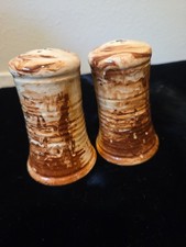 A Pair of Sitka Clay Alaska ,Brown and Cream Salt and Pepper Shakers Signed 4