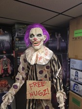 Spirit Halloween Animated Life-Size Animatronic Prop Hugz the Clown picture