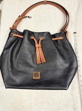 Dooney & Bourke Pebble Grain Drawstring Bucket Bag Black Tan Leather picture