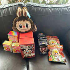 lol of multiple items. Popmart, Baby Three picture
