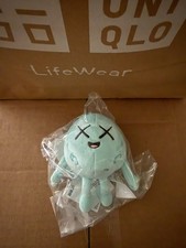 Uniqlo x Kaws Universe Moon Plush Keychain , new with tags in bag  picture
