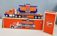 LIONEL Flatbed Toy Truck TMT-18405 W/Operating Lights & Sounds and Caboose NIB picture