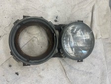 1979-1981 VW DASHER HEADLIGHT ASSEMBLY, BEZELS. MISSING ONE BULB. FAIR CONDITION picture