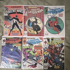 Amazing Spiderman lot of Key Books. First Venom, Brand New Day, Mcfarlanes picture