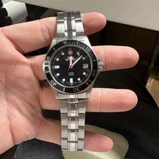 Mens Swiss Military Round Silver Tone Black Textured Dial Date Watch 095.0674 F1 picture