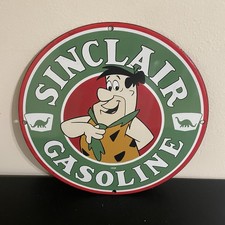 VINTAGE SINCLAIR FLINT STONE MAN GASOLINE OIL PORCELAIN SIGN picture