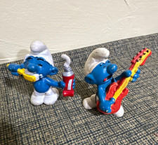 The Smurfs Plastic Smurf Figure Set of 2 Blue Figurines w/ Guitar and tooth bru picture