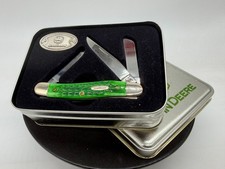 Case XX 6318 SS John Deere 3 Blade Stockman Green Bone Tin Medallion picture