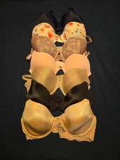7 lightly padded bras all 34C. Various brands including Maidenform, Laura Ashley picture