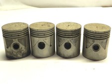 VINTAGE 1936-1941 PLYMOUTH SET OF 4 O/S PISTONS MOPAR BRAND #866289/124598 NOS  picture