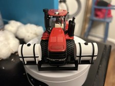 Custom Ertl 1/64 Case IH 595 Quadtrac With Saddle Tanks And 3 Point Hitch picture
